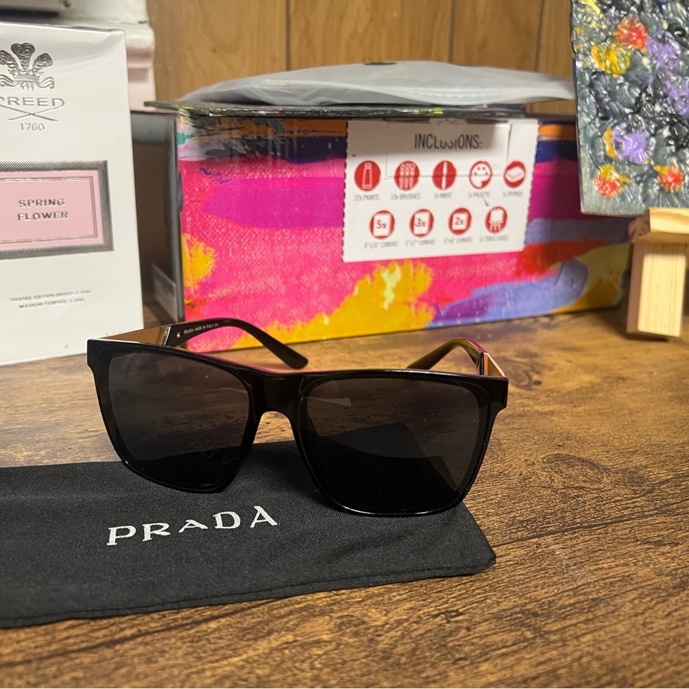Prada Black Sunglasses with Gold and Red Temple Accents - Picture 2 of 3